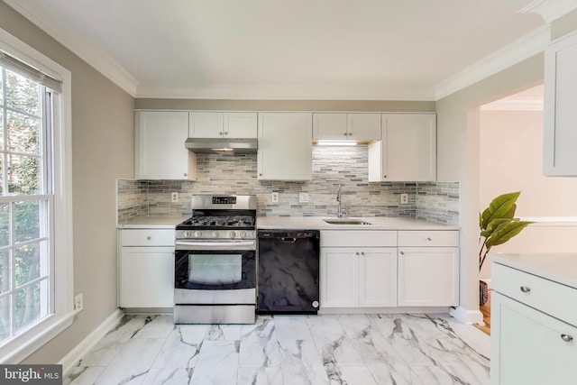 kitchen with stainless steel range with gas stovetop, a sink, light countertops, under cabinet range hood, and black dishwasher