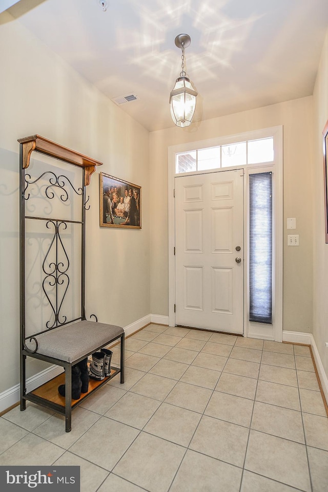 107 Washington Square Ct, Occoquan, VA 22125 - foyer with light tile patterned floors, baseboards, and visible vents