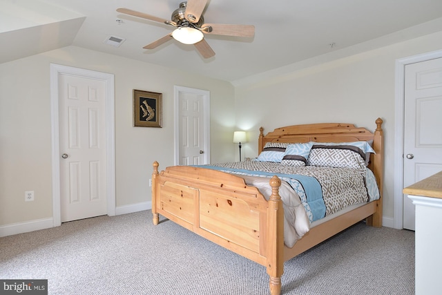 107 Washington Square Ct, Occoquan, VA 22125 - bedroom featuring visible vents, carpet floors, baseboards, ceiling fan, and vaulted ceiling