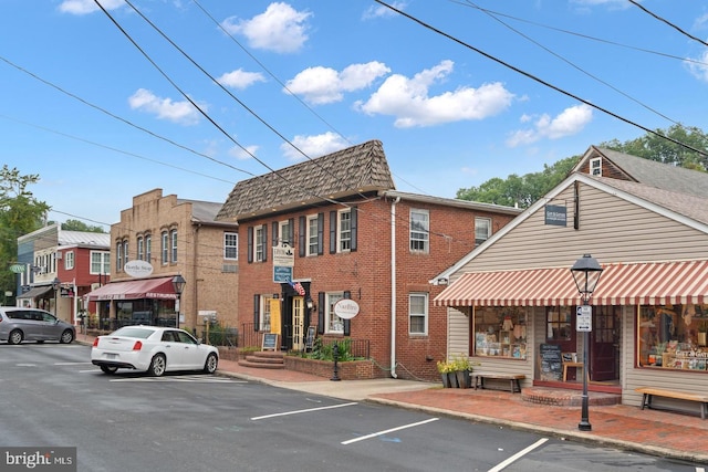 107 Washington Square Ct, Occoquan, VA 22125 - view of building exterior featuring uncovered parking