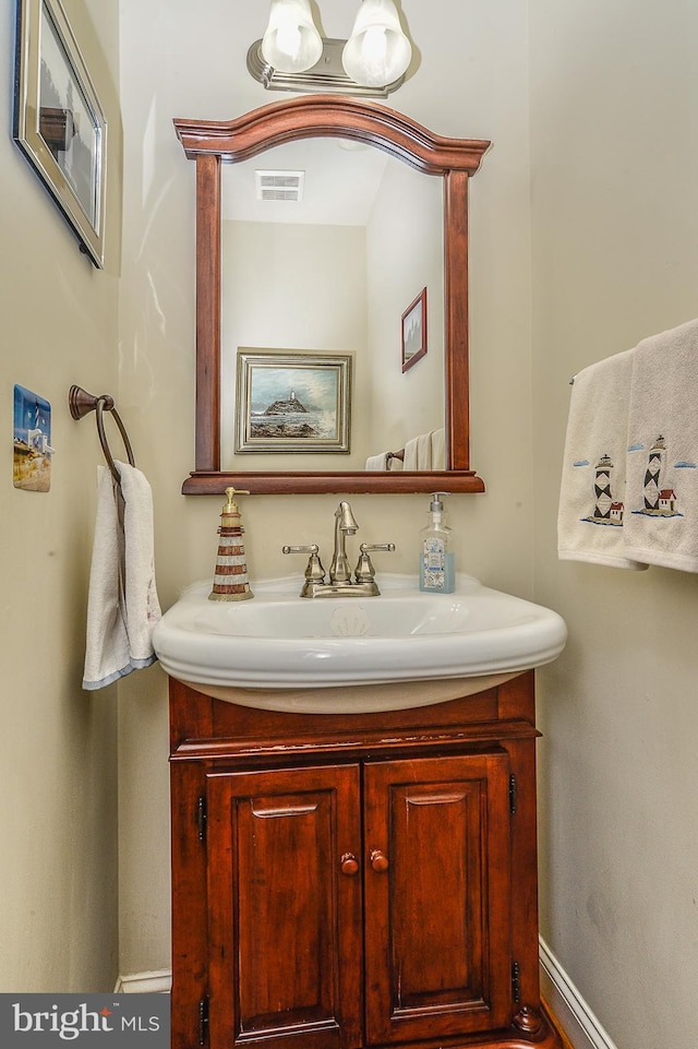 107 Washington Square Ct, Occoquan, VA 22125 - bathroom with visible vents, baseboards, and vanity