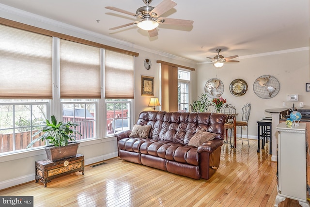 107 Washington Square Ct, Occoquan, VA 22125 - living area with a ceiling fan, baseboards, visible vents, and light wood-style flooring