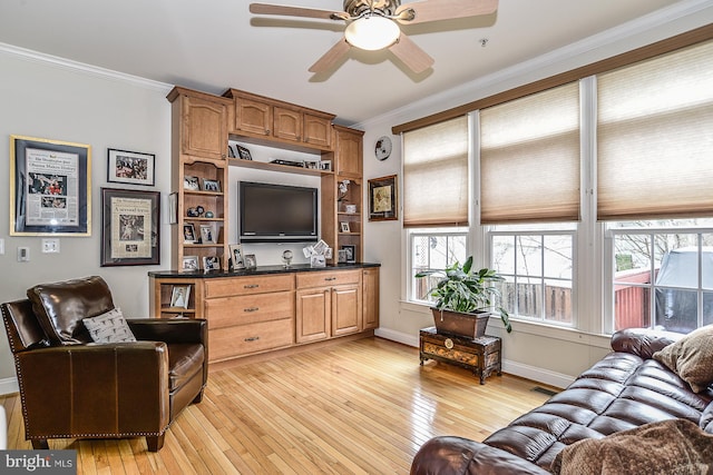 107 Washington Square Ct, Occoquan, VA 22125 - living room with light wood-style floors, ornamental molding, baseboards, and a ceiling fan