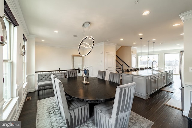 dining space featuring recessed lighting, stairs, ornamental molding, dark wood-style floors, and visible vents