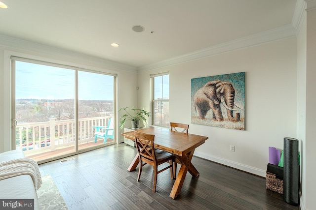dining room featuring visible vents, recessed lighting, ornamental molding, and dark wood finished floors