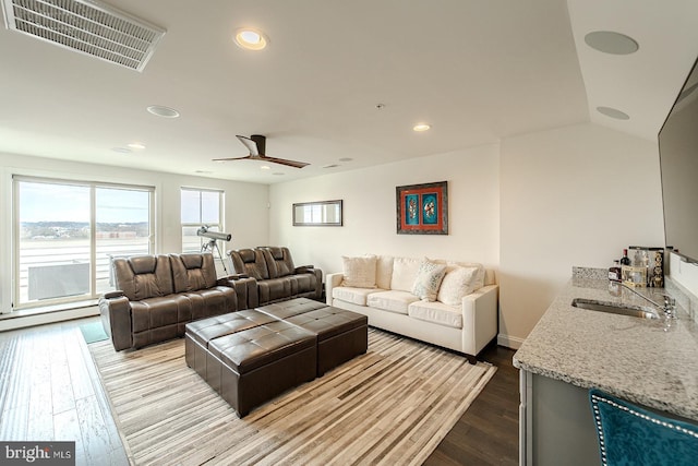 living room featuring recessed lighting, visible vents, ceiling fan, and dark wood finished floors