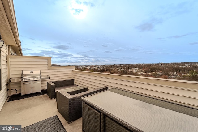balcony featuring a patio and a grill