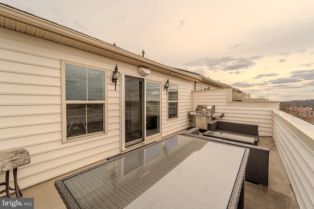 balcony featuring area for grilling