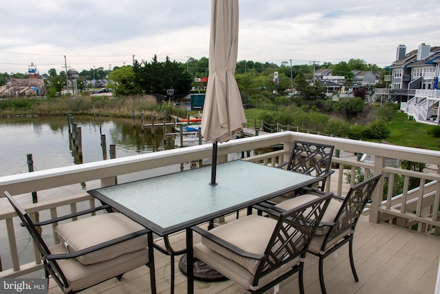 8074 Windward Key Dr, Chesapeake Beach, MD 20732 - wooden terrace with a water view and outdoor dining area