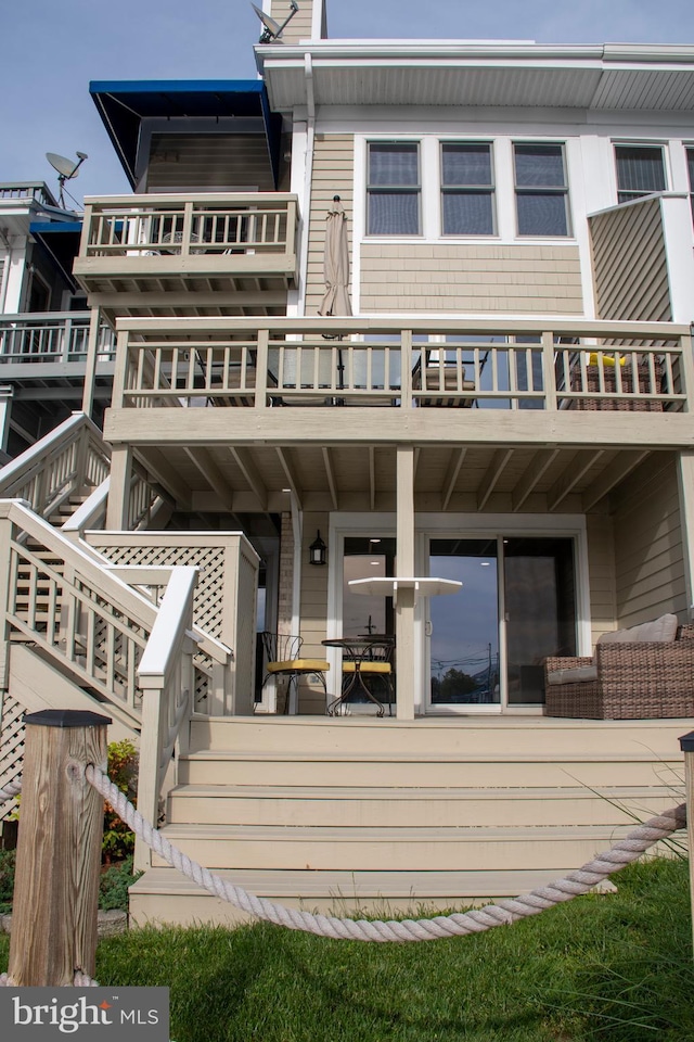 8074 Windward Key Dr, Chesapeake Beach, MD 20732 - rear view of house featuring a balcony and stairs
