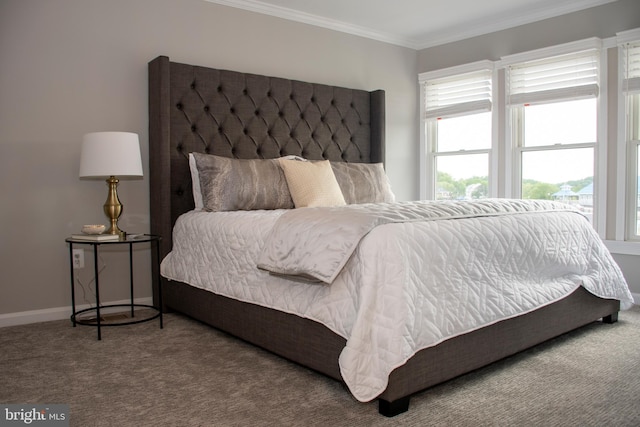 8074 Windward Key Dr, Chesapeake Beach, MD 20732 - carpeted bedroom featuring ornamental molding and baseboards