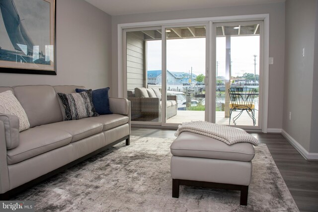 8074 Windward Key Dr, Chesapeake Beach, MD 20732 - living room featuring wood finished floors, healthy amount of natural light, and baseboards