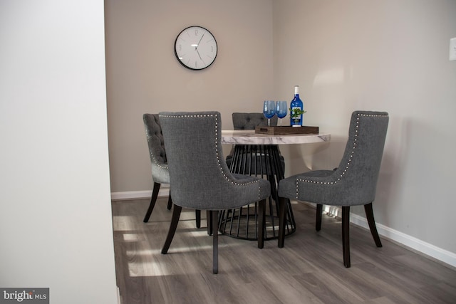 8074 Windward Key Dr, Chesapeake Beach, MD 20732 - dining room featuring wood finished floors and baseboards