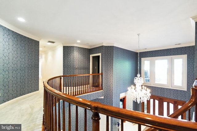 hallway featuring crown molding, an upstairs landing, a chandelier, visible vents, and wallpapered walls