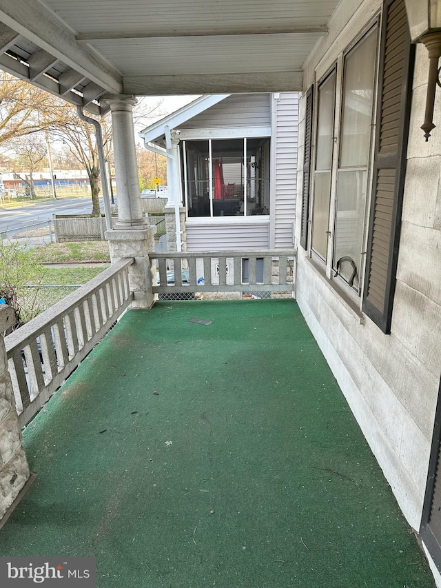 view of patio / terrace with a sunroom