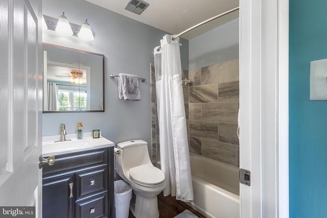 10230 Faire Commons Ct, Burke, VA 22015 - bathroom with visible vents, shower / tub combo with curtain, vanity, wood finished floors, and toilet