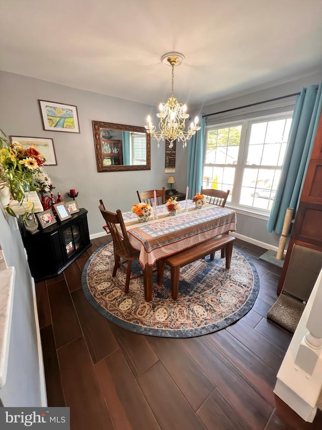 10230 Faire Commons Ct, Burke, VA 22015 - dining space with baseboards, dark wood-type flooring, and a chandelier