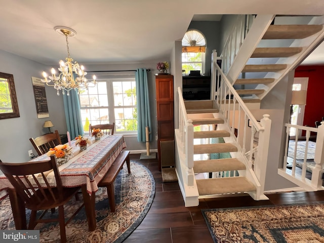 10230 Faire Commons Ct, Burke, VA 22015 - dining space featuring dark wood finished floors, baseboards, stairs, and a notable chandelier
