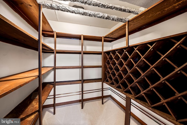 wine area with light colored carpet