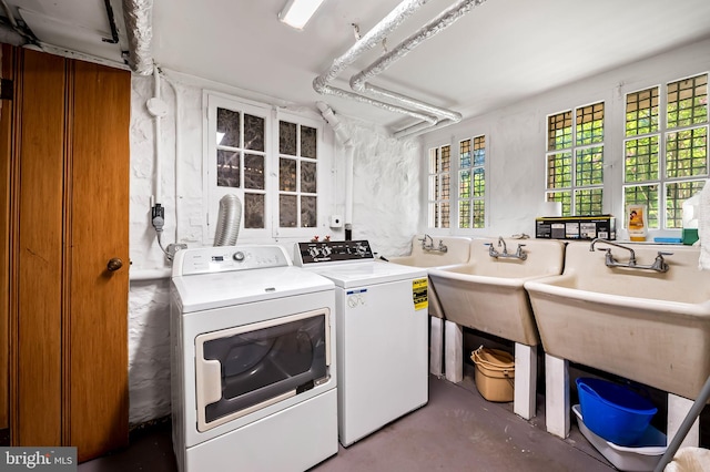 laundry area featuring laundry area and washing machine and dryer