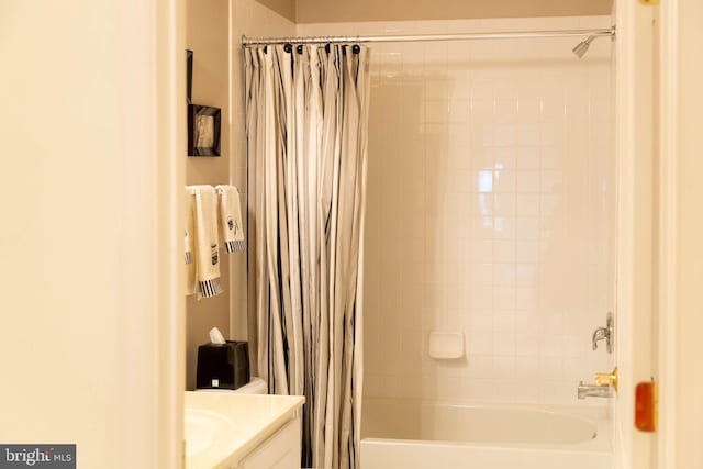 full bath featuring shower / bath combo and vanity