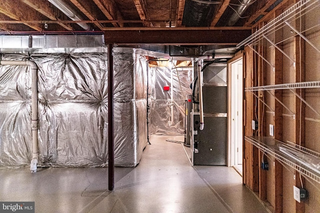 unfinished basement with heating unit