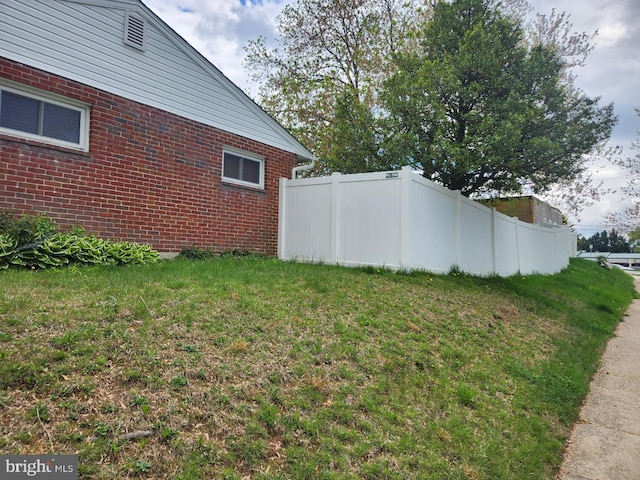 view of yard featuring fence