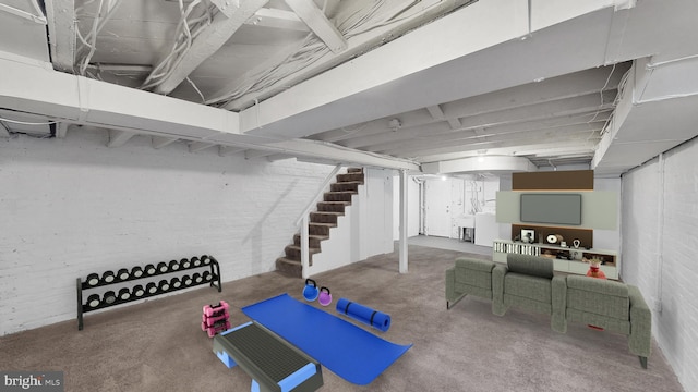 903 K St NE, Washington, DC 20002 - workout area with brick wall and carpet flooring