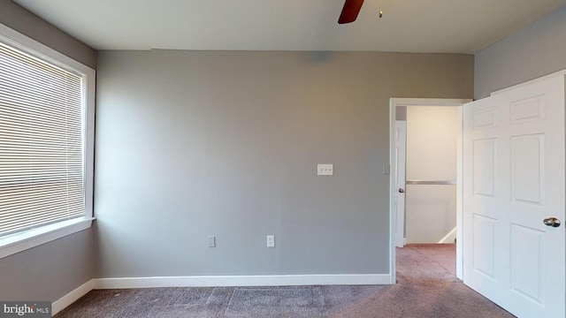 903 K St NE, Washington, DC 20002 - carpeted empty room with baseboards and ceiling fan