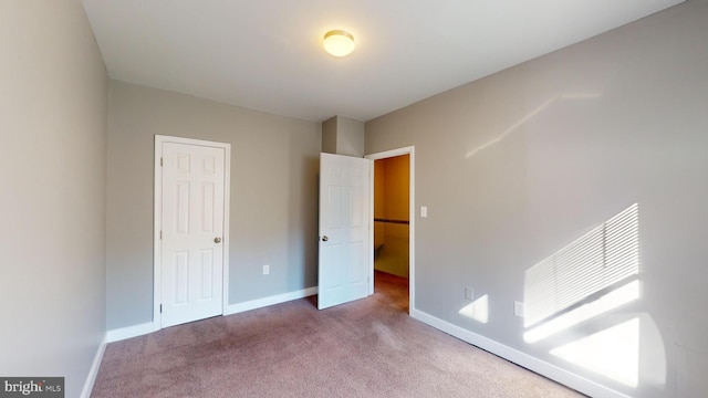 903 K St NE, Washington, DC 20002 - unfurnished bedroom with carpet and baseboards