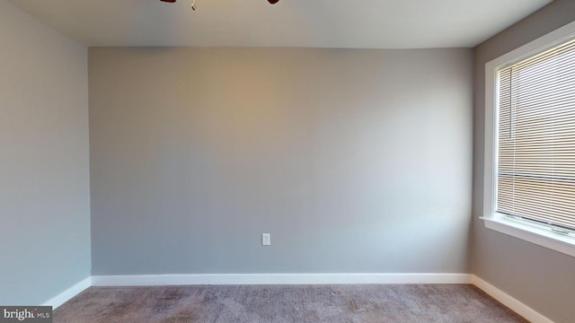 903 K St NE, Washington, DC 20002 - unfurnished room with a ceiling fan, baseboards, and carpet floors