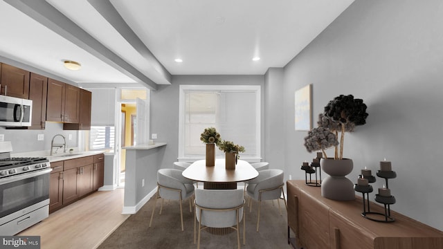 903 K St NE, Washington, DC 20002 - dining area featuring baseboards, recessed lighting, and light wood-style flooring