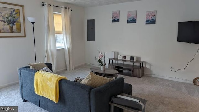 living area with carpet floors, baseboards, and electric panel
