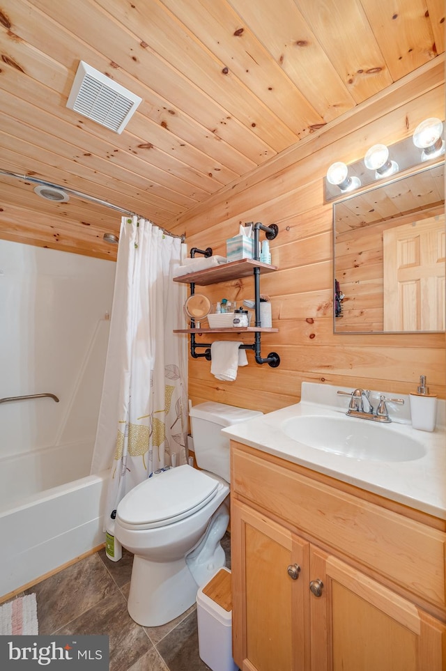 full bathroom with visible vents, vanity, toilet, shower / bathtub combination with curtain, and wooden walls