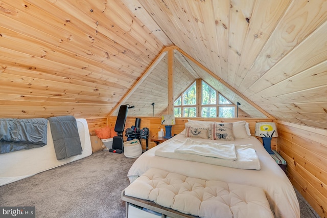 bedroom with carpet floors, wood ceiling, wooden walls, and vaulted ceiling