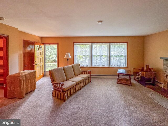 4564 Mountain Rd, Pasadena, MD 21122 - carpeted living area featuring baseboard heating