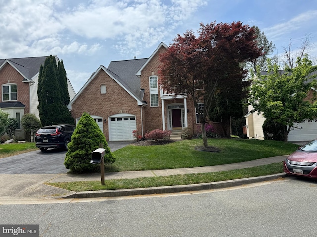 206 Cherrywood Ter, Gaithersburg, MD 20878 - traditional-style home with asphalt driveway, brick siding, a front yard, and a garage