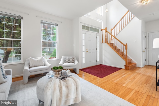 206 Cherrywood Ter, Gaithersburg, MD 20878 - entrance foyer featuring hardwood / wood-style floors, stairs, and baseboards