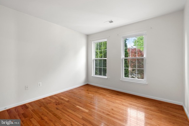 206 Cherrywood Ter, Gaithersburg, MD 20878 - spare room with light wood-style flooring and baseboards