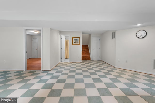 206 Cherrywood Ter, Gaithersburg, MD 20878 - finished below grade area with baseboards, stairs, and recessed lighting