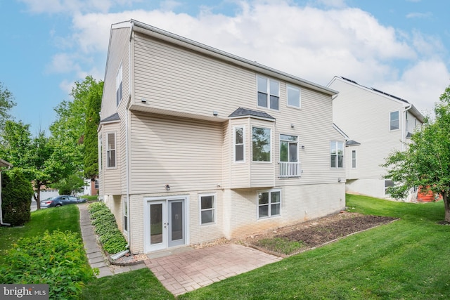 206 Cherrywood Ter, Gaithersburg, MD 20878 - back of property featuring a lawn, french doors, and a patio area