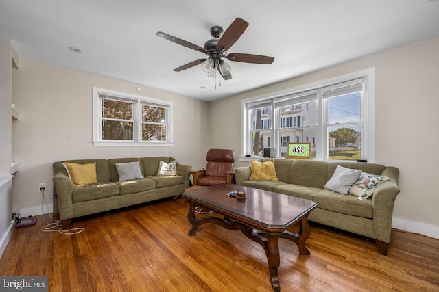 326 Glasgow St, Pottstown, PA 19464 - living area featuring baseboards, a ceiling fan, wood finished floors, and a wealth of natural light