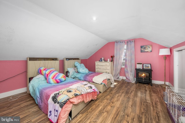 326 Glasgow St, Pottstown, PA 19464 - bedroom featuring baseboards, a wood stove, wood finished floors, and lofted ceiling