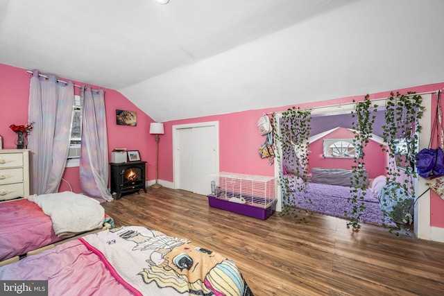326 Glasgow St, Pottstown, PA 19464 - bedroom featuring vaulted ceiling, baseboards, a wood stove, and wood finished floors