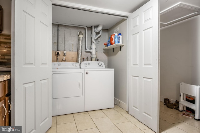 326 Glasgow St, Pottstown, PA 19464 - clothes washing area with independent washer and dryer, light tile patterned flooring, and laundry area