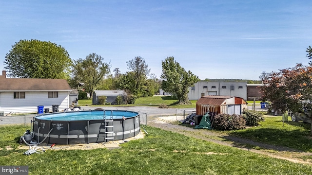 326 Glasgow St, Pottstown, PA 19464 - pool featuring an outbuilding, a shed, a yard, and fence