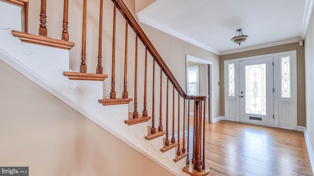 107 S Dover Ave, Atlantic City, NJ 08401 - foyer entrance featuring crown molding, baseboards, stairs, and wood finished floors
