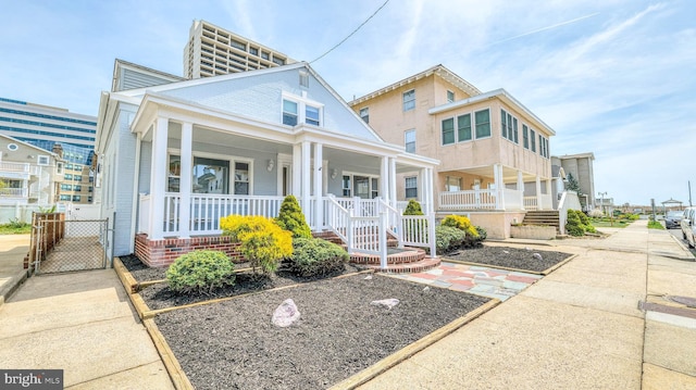 107 S Dover Ave, Atlantic City, NJ 08401 - view of front facade featuring a porch and a gate