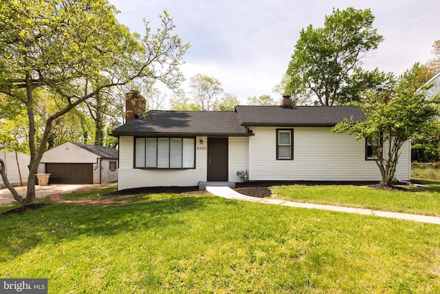 single story home featuring an outdoor structure, a garage, a front yard, and a chimney