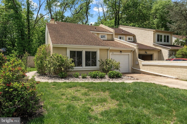 view of front facade featuring stucco siding, an attached garage, driveway, a chimney, and roof with shingles